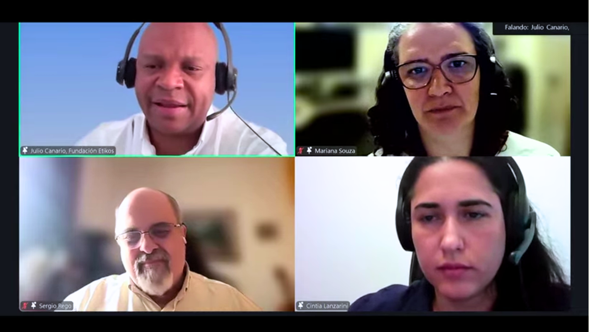 Screenshot of a video conference with Julio Canario (Fundaci&oacute;n Etikos), Mariana Souza, Sergio Rego, and Cintia Lanzarini, all wearing headsets, with Julio speaking.