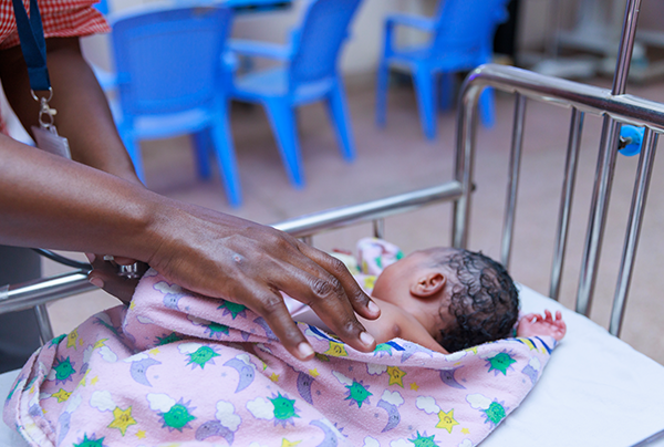 Baby in hospital with nurse